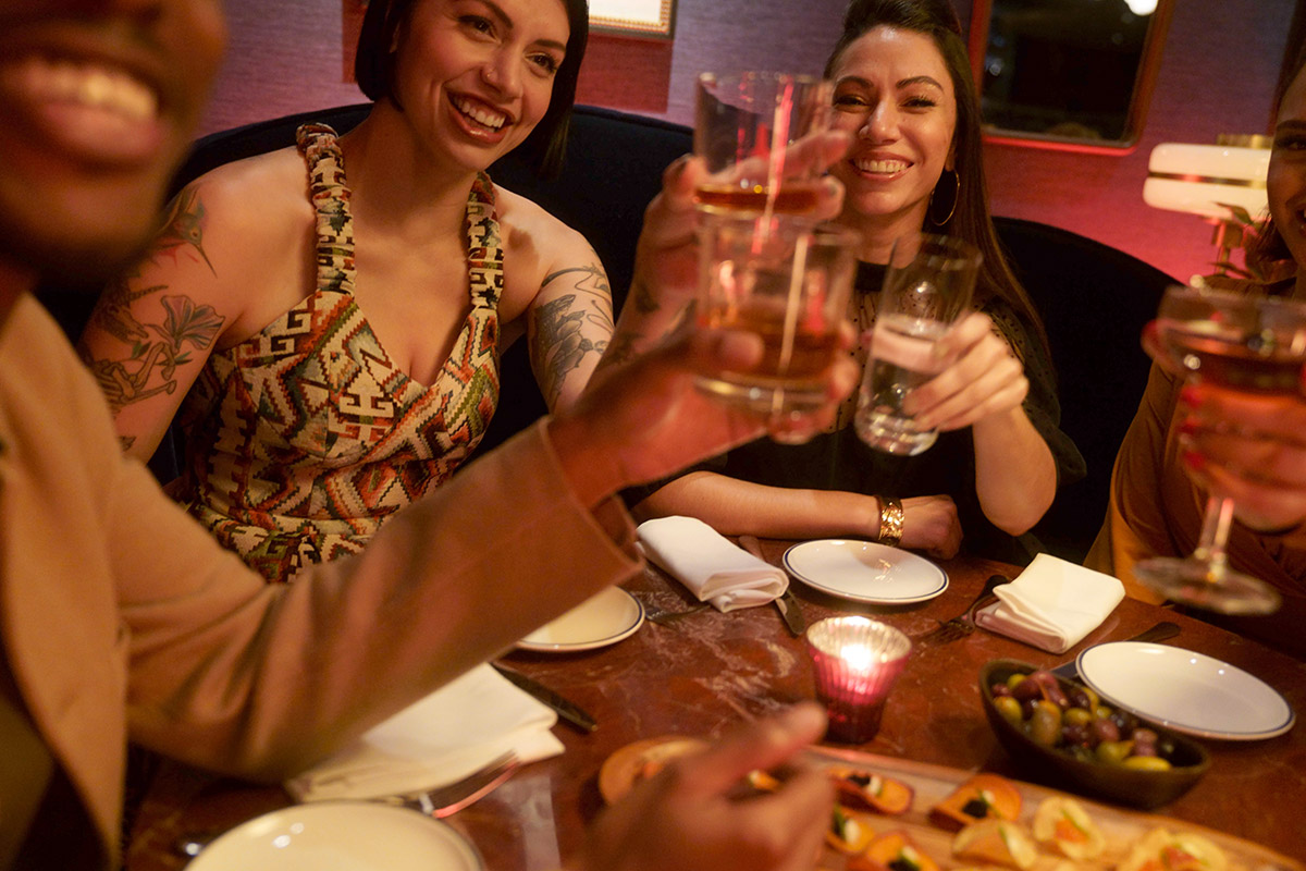 Friends enjoying Maker’s Mark bourbon