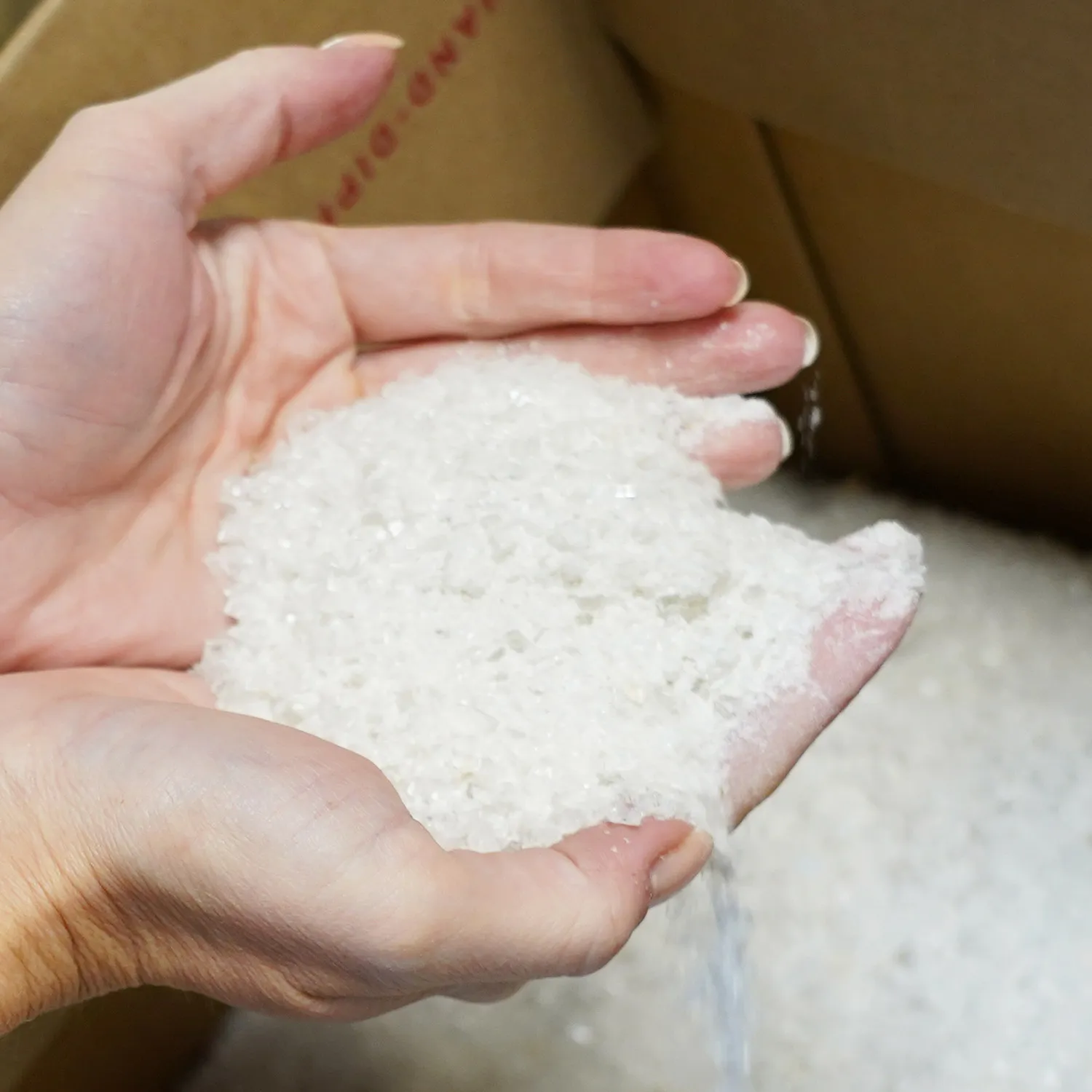 crushed glass in hands