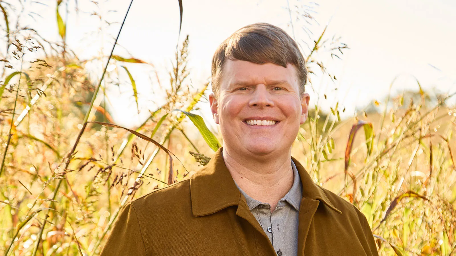 Rob Samuels headshot in wheat field